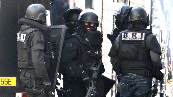 Members of French special police forces of Research and Intervention Brigade arrive during an operation in Saint-Denis, near Paris - Sputnik International