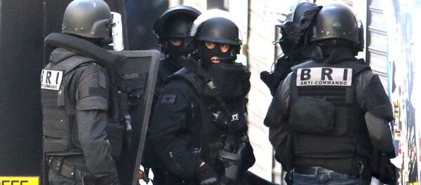 Members of French special police forces of Research and Intervention Brigade arrive during an operation in Saint-Denis, near Paris - Sputnik International