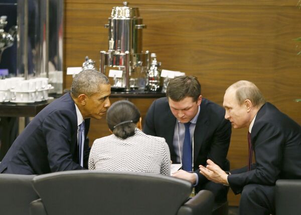 U.S. President Barack Obama (L) talks with Russian President Vladimir Putin (R) and U.S. security advisor Susan Rice (2nd L) prior to the opening session of the Group of 20 (G20) Leaders summit summit in the Mediterranean resort city of Antalya, Turkey November 15, 2015 U.S. President Barack Obama (L) talks with Russian President Vladimir Putin (R) and U.S. security advisor Susan Rice (2nd L) prior to the opening session of the Group of 20 (G20) Leaders summit summit in the Mediterranean resort city of Antalya, Turkey November 15, 2015 - Sputnik International