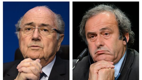 A combination made on October 29, 2015 shows two pictures showing Fifa president president Sepp Blatter (L) on May 30, 2015 in Zurich, and UEFA leader Michel Platini on May 28, 2015 in Zurich - Sputnik International