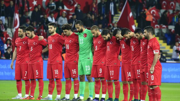 Turkey's players observe a minute of silence to honour the victims of the Paris attacks prior to an international friendly soccer match against Greece, in Istanbul, Tuesday Nov. 17, 2015. - Sputnik International