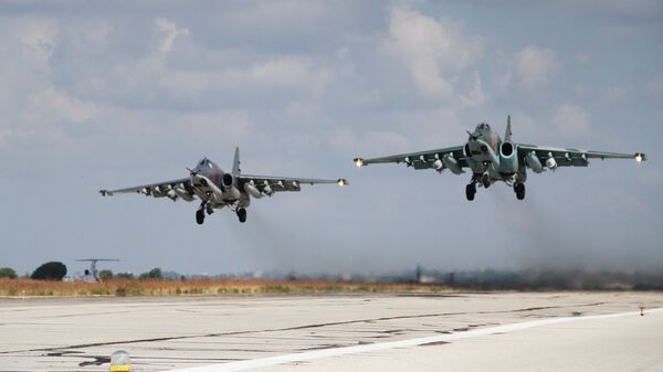 Russian Su-25 attack aircraft take off from the Khmeimim airbase in Syria. - Sputnik International