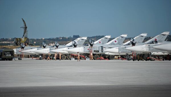 Su-24 bombers of the Russian Aerospace Defense Forces parked at the Khmeymim Air Base in Latakia, Syria. - Sputnik International