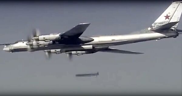 Russian Tu-95 bomber launches a cruise missile at a target in Syria Russian Tu-95 bomber launches a cruise missile at a target in Syria - Sputnik International