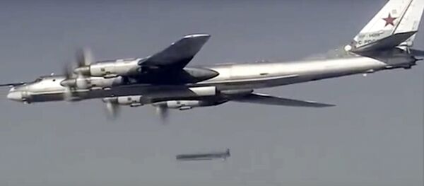 Russian Tu-95 bomber launches a cruise missile at a target in Syria Russian Tu-95 bomber launches a cruise missile at a target in Syria - Sputnik International