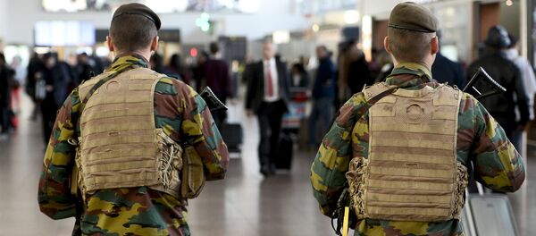 Military police soldiers patrol the Brussels Airport in Zaventem, eastern Brussels - Sputnik International