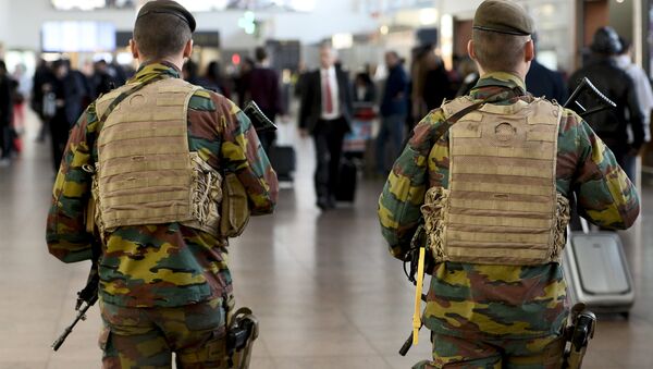 Military police soldiers patrol the Brussels Airport in Zaventem, eastern Brussels - Sputnik International