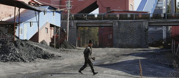 A miner walks at a coal mine, China - Sputnik International