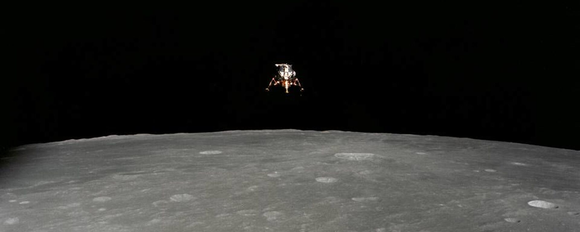 The Apollo 12 Lunar Module (LM), in a lunar landing configuration, is photographed in lunar orbit from the Command and Service Modules (CSM) on Nov. 19, 1969 - Sputnik International, 1920, 02.10.2023
