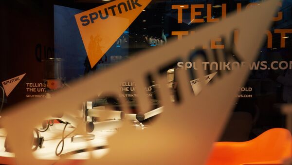 Pavilion of the Sputnik international information brand at the Lenexpo Exhibition Center ahead of the 2015 St. Petersburg International Economic Forum - Sputnik International