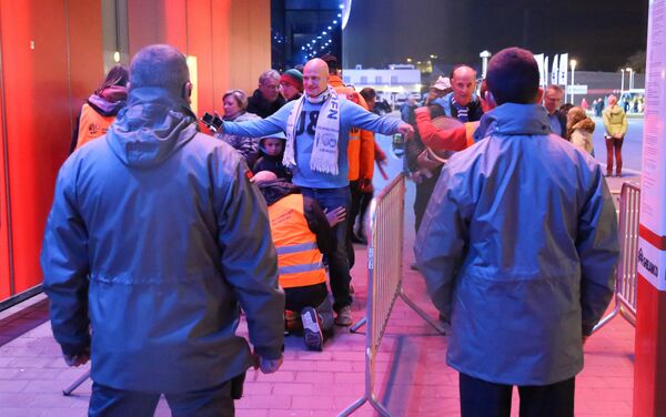 Security guards search fans as they enter the stadium before the Jupiler Pro League match between KAA Gent and Westerlo, in Gent, on November 20, 2015, as part of security measures set following Paris' attacks. - Sputnik International