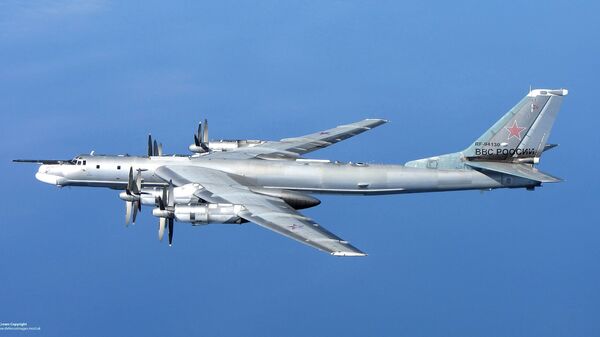 A Russian Tu-95 Bear 'H' photographed from a RAF Typhoon Quick Reaction Alert aircraft (QRA) with 6 Squadron from RAF Leuchars in Scotland in April 2014 - Sputnik International