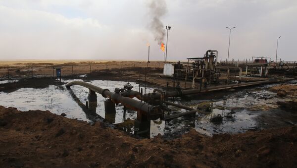 Oil well pumps are seen in the Rmeilane oil field in Syria's northerneastern Hasakeh province on July 15, 2015 - Sputnik International