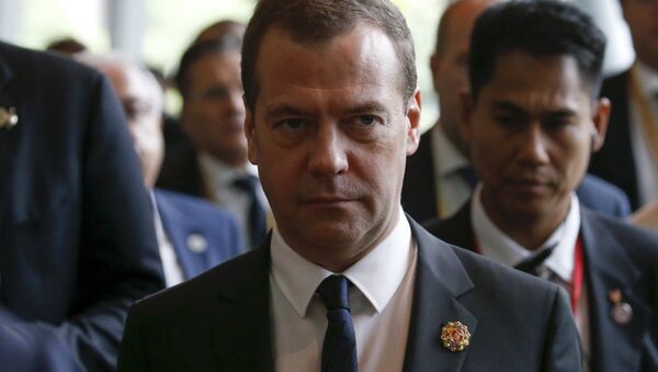 Russian Prime Minister Dmitry Medvedev leaves the East Asia Summit (EAS) meeting in Kuala Lumpur, Malaysia November 22, 2015 - Sputnik International