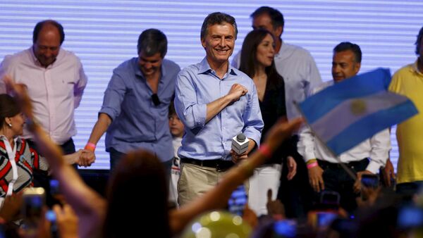 Mauricio Macri, presidential candidate of the Cambiemos (Let's Change) coalition, gestures to his supporters after the presidential election in Buenos Aires, Argentina, November 22, 2015 - Sputnik International