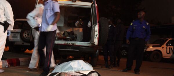 The body of a victim in front of the Radisson Blu hotel after an attack by gunmen on the hotel in Bamako, Mali, Friday, Nov. 20, 2015 The body of a victim in front of the Radisson Blu hotel after an attack by gunmen on the hotel in Bamako, Mali, Friday, Nov. 20, 2015 - Sputnik International