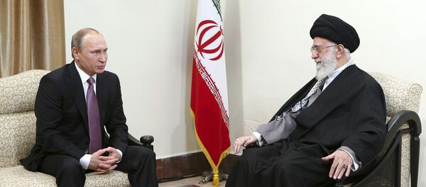 In this Monday, Nov. 23, 2015 photo released by an official website of the office of the Iranian supreme leader, Supreme Leader Ayatollah Ali Khamenei, right, listens to Russian President Vladimir Putin during their meeting in Tehran, Iran In this Monday, Nov. 23, 2015 photo released by an official website of the office of the Iranian supreme leader, Supreme Leader Ayatollah Ali Khamenei, right, listens to Russian President Vladimir Putin during their meeting in Tehran, Iran - Sputnik International