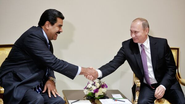 Russian President Vladimir Putin, right, and Venezuelan President Nicolas Maduro during their meeting in Tehran, Iran, November 23, 2015 - Sputnik International