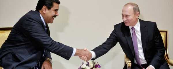 Russian President Vladimir Putin, right, and Venezuelan President Nicolas Maduro during their meeting in Tehran, Iran, November 23, 2015 - Sputnik International