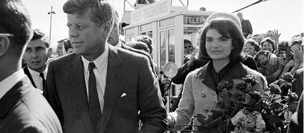President John F. Kennedy and his wife Jacqueline Kennedy are greeted by an enthusiastic crowd upon their arrival at Dallas Airport, on November 22, 1963. Only a few hours later the president was assassinated while riding in an open-top limousine through the city. - Sputnik International
