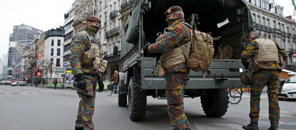 Belgian soldiers patrol in central Brussels as police search the area during a continued high level of security following the recent deadly Paris attacks, Belgium, November 24, 2015 Belgian soldiers patrol in central Brussels as police search the area during a continued high level of security following the recent deadly Paris attacks, Belgium, November 24, 2015 - Sputnik International