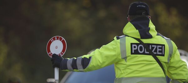 German police conducts a control at the German-Belgian border in Aachen, Germany, to check vehicles and verify the identity of travellers November 23, 2015 as security measures increased after recent deadly attacks in Paris - Sputnik International