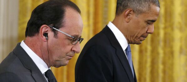 U.S. President Barack Obama (R) and French President Francois Hollande listen during a joint news conference in the East Room of the White House in Washington November 24, 2015 U.S. President Barack Obama (R) and French President Francois Hollande listen during a joint news conference in the East Room of the White House in Washington November 24, 2015 - Sputnik International