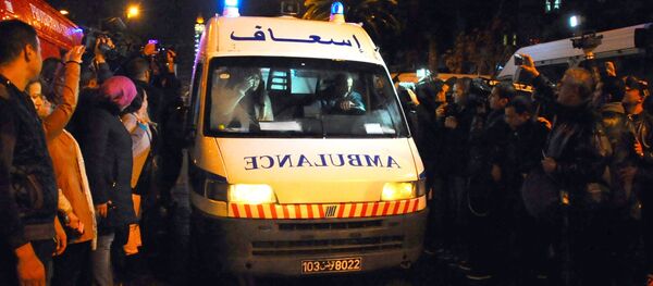 An ambulance rushes to the scene of a bus explosion in the center of the capital, Tunis, Tunisia, Tuesday, Nov. 24, 2015. An ambulance rushes to the scene of a bus explosion in the center of the capital, Tunis, Tunisia, Tuesday, Nov. 24, 2015. - Sputnik International