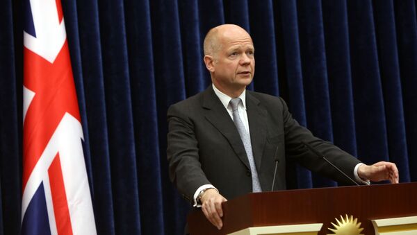 British Foreign Secretary William Hague speaks at a joint news conference with Kurdish President Massoud Barzani in Irbil, a city in the Kurdish controlled north, 217 miles (350 kilometers) north of Baghdad, Iraq, Friday, June 27, 2014. - Sputnik International