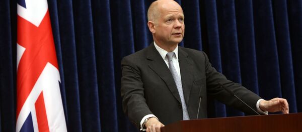 British Foreign Secretary William Hague speaks at a joint news conference with Kurdish President Massoud Barzani in Irbil, a city in the Kurdish controlled north, 217 miles (350 kilometers) north of Baghdad, Iraq, Friday, June 27, 2014. - Sputnik International