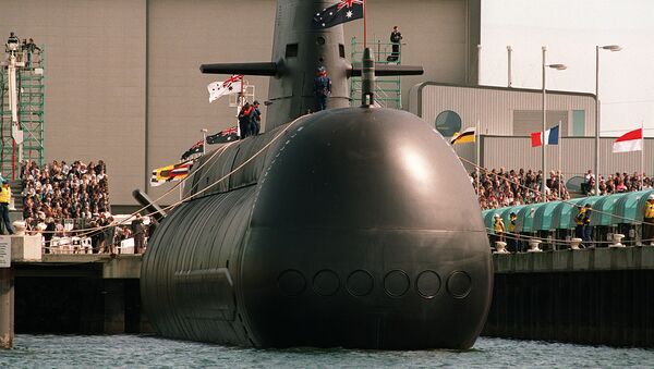 The first high-tech Collins class conventional powered submarine being lowered into the water at Port Adelaide - Sputnik International