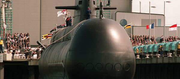 The first high-tech Collins class conventional powered submarine being lowered into the water at Port Adelaide - Sputnik International
