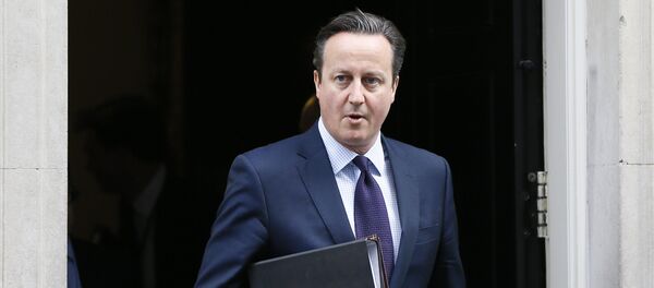 This file photo shows Britain's Prime Minister David Cameron leaves 10 Downing Street to attend Parliament in London, - Sputnik International