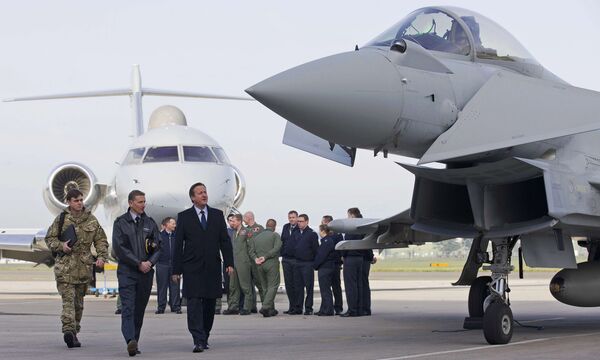 Britain's Prime Minister David Cameron (3rd L) looks at an RAF Eurofighter Typhoon fighter jet during his visit to Royal Air Force station RAF Northolt in London, Britain November 23, 2015. Britain's Prime Minister David Cameron (3rd L) looks at an RAF Eurofighter Typhoon fighter jet during his visit to Royal Air Force station RAF Northolt in London, Britain November 23, 2015. - Sputnik International