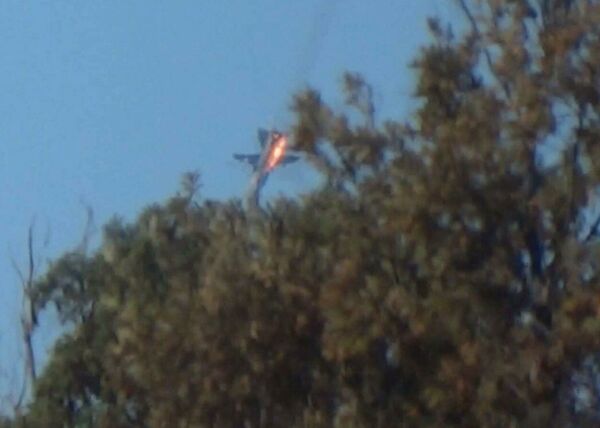 The Russian Su-24 bomber crashes in flames in a mountainous area in northern Syria after it was shot down by Turkish fighter jets near the Turkish-Syrian border November 24, 2015. The Russian Su-24 bomber crashes in flames in a mountainous area in northern Syria after it was shot down by Turkish fighter jets near the Turkish-Syrian border November 24, 2015. - Sputnik International