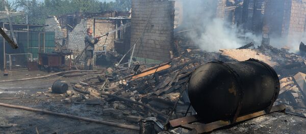 Private houses destroyed during an artillery attack by the Ukrainian army Private houses destroyed during an artillery attack by the Ukrainian army - Sputnik International