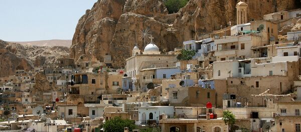A general view of the Christian Syrian village of Maalula, 60 kms north of Damascus, on June 29, 2009 A general view of the Christian Syrian village of Maalula, 60 kms north of Damascus, on June 29, 2009 - Sputnik International