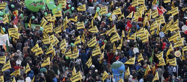 Protesters demonstrate during a rally ahead of the 2015 Paris Climate Conference, known as the COP21 summit, in Berlin, Germany November 29, 2015 Protesters demonstrate during a rally ahead of the 2015 Paris Climate Conference, known as the COP21 summit, in Berlin, Germany November 29, 2015 - Sputnik International