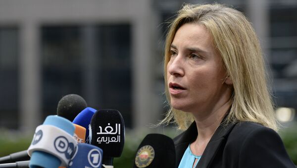 EU foreign policy chief Federica Mogherini speaks to the press as she arrives for a summit on relations between the European Union and Turkey and on the migration crisis at the EU headquarters in Brussels on November 29, 2015. - Sputnik International