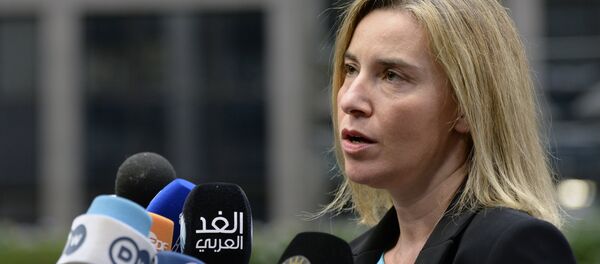 EU foreign policy chief Federica Mogherini speaks to the press as she arrives for a summit on relations between the European Union and Turkey and on the migration crisis at the EU headquarters in Brussels on November 29, 2015. EU foreign policy chief Federica Mogherini speaks to the press as she arrives for a summit on relations between the European Union and Turkey and on the migration crisis at the EU headquarters in Brussels on November 29, 2015. - Sputnik International