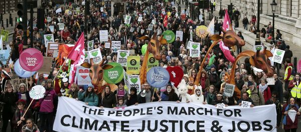 Protesters demonstrate during a rally held the day before the start of the Paris Climate Change Summit, in London, Britain November 29, 2015 Protesters demonstrate during a rally held the day before the start of the Paris Climate Change Summit, in London, Britain November 29, 2015 - Sputnik International