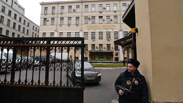 A police officer at the Prosecutor-General's Office in Bolshaya Dmitrovka Street, Moscow - Sputnik International