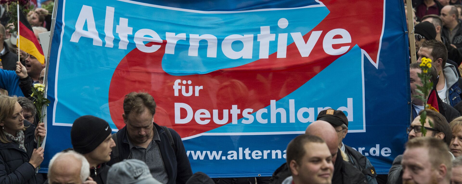 Supporters of the right-wing populist Alternative for Germany (AfD) party display an AfD banner during a demonstration by AfD supporters in Berlin (File) - Sputnik International, 1920, 09.10.2023