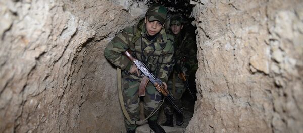 Soldiers of the Syrian Arab Army in Darayya, a Damascus suburb Soldiers of the Syrian Arab Army in Darayya, a Damascus suburb - Sputnik International