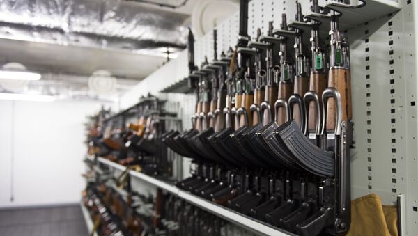 Some AK-47 Kalachnikov assault rifles are stored among some 8,000 weapons at the Criminal Research Institute of the National Gendarmerie (IRCGN), on May 19, 2015 in Pontoise, outside Paris - Sputnik International
