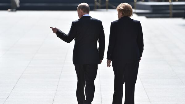 Putin and Merkel - Sputnik International