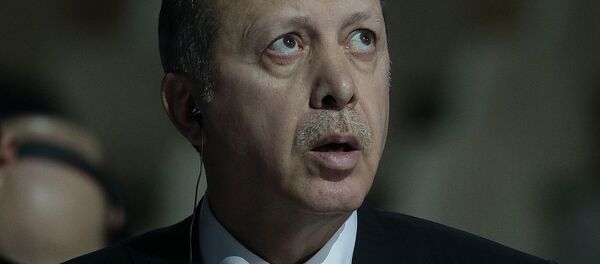 Turkish President Recep Tayyip Erdogan reacts as he attends the COP 21 United Nations conference on climate change, on November 30, 2015 at Le Bourget, on the outskirts of the French capital Paris Turkish President Recep Tayyip Erdogan reacts as he attends the COP 21 United Nations conference on climate change, on November 30, 2015 at Le Bourget, on the outskirts of the French capital Paris - Sputnik International