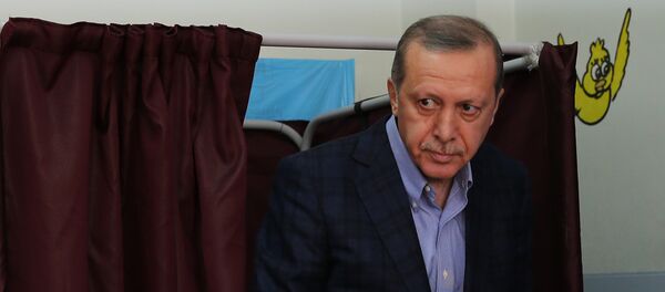 Turkey's President Recep Tayyip Erdogan leaves a voting booth as he prepares to cast his vote at a polling station, in Istanbul, Sunday, Nov. 1, 2015 Turkey's President Recep Tayyip Erdogan leaves a voting booth as he prepares to cast his vote at a polling station, in Istanbul, Sunday, Nov. 1, 2015 - Sputnik International