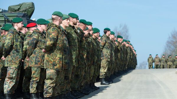 German army soldiers who are members of the Stabilisation forces line up at the barracks Erzgebirgskaserne in Marienberg, eastern Germany, on April 10, 2015, during a military exercise Noble Jump that is part of Nato Response Force - Sputnik International