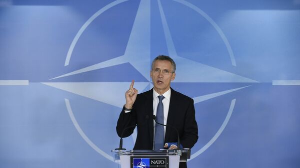 NATO Secretary General Jens Stoltenberg speaks during a press conference before a Foreign Affairs meeting at the NATO headquarters in Brussels on December 01, 2015 - Sputnik International